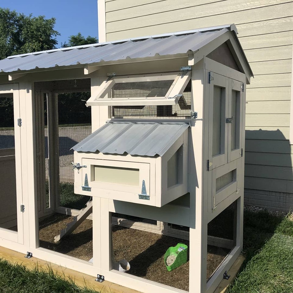 4′ x 9′ California Coop with 3′ x 4′ henhouse painted to match the house with a Dutch door and rain barrel waterbar system in Ohio