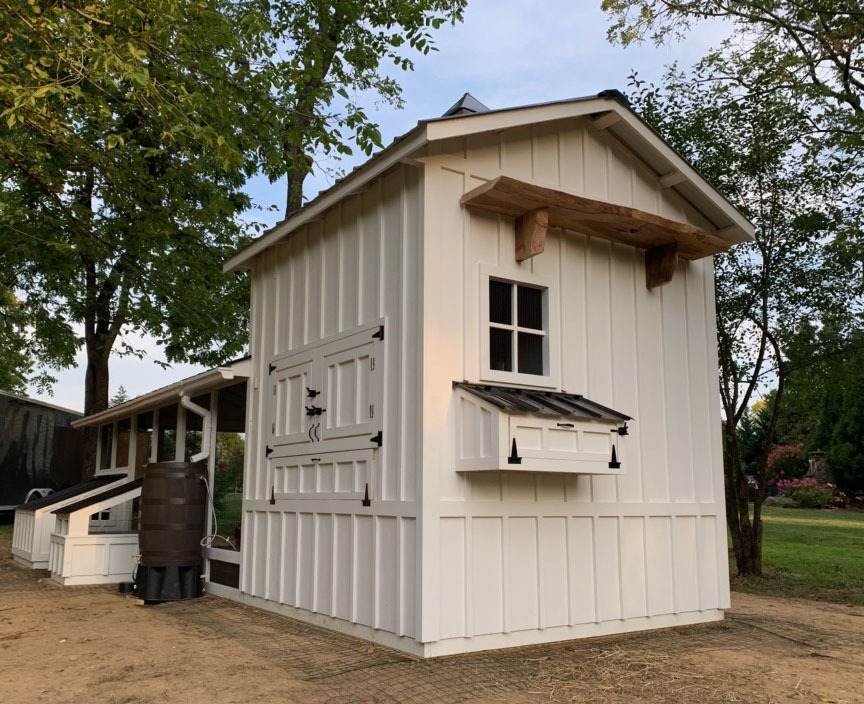 Henhouse view of custom Craftsman Coop with duck house and duck dipper