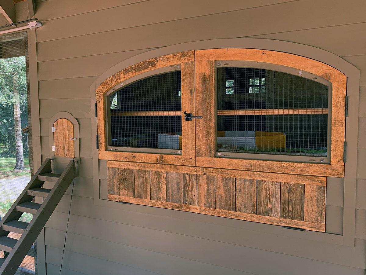 Carolina Coops Custom Alabama Coop interior with removable reclaimed barn wood henhouse doors