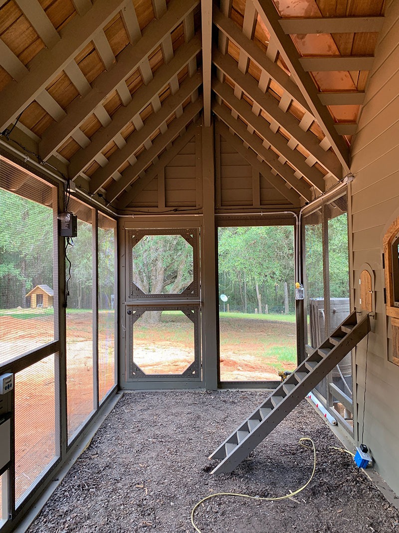 Carolina Coops custom Alabama Chicken Coop inside the run with hand cut cedar shake shingle roofing and reclaimed barn wood