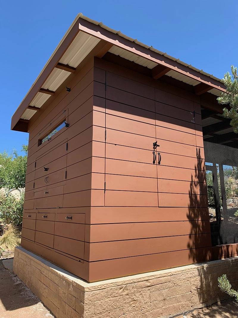 Henhouse of a custom modern chicken coop with shiplap siding in Santa Fe, NM