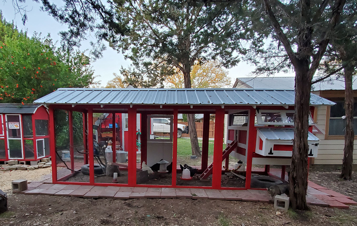 6’x18′ American Coop painted red with white trim