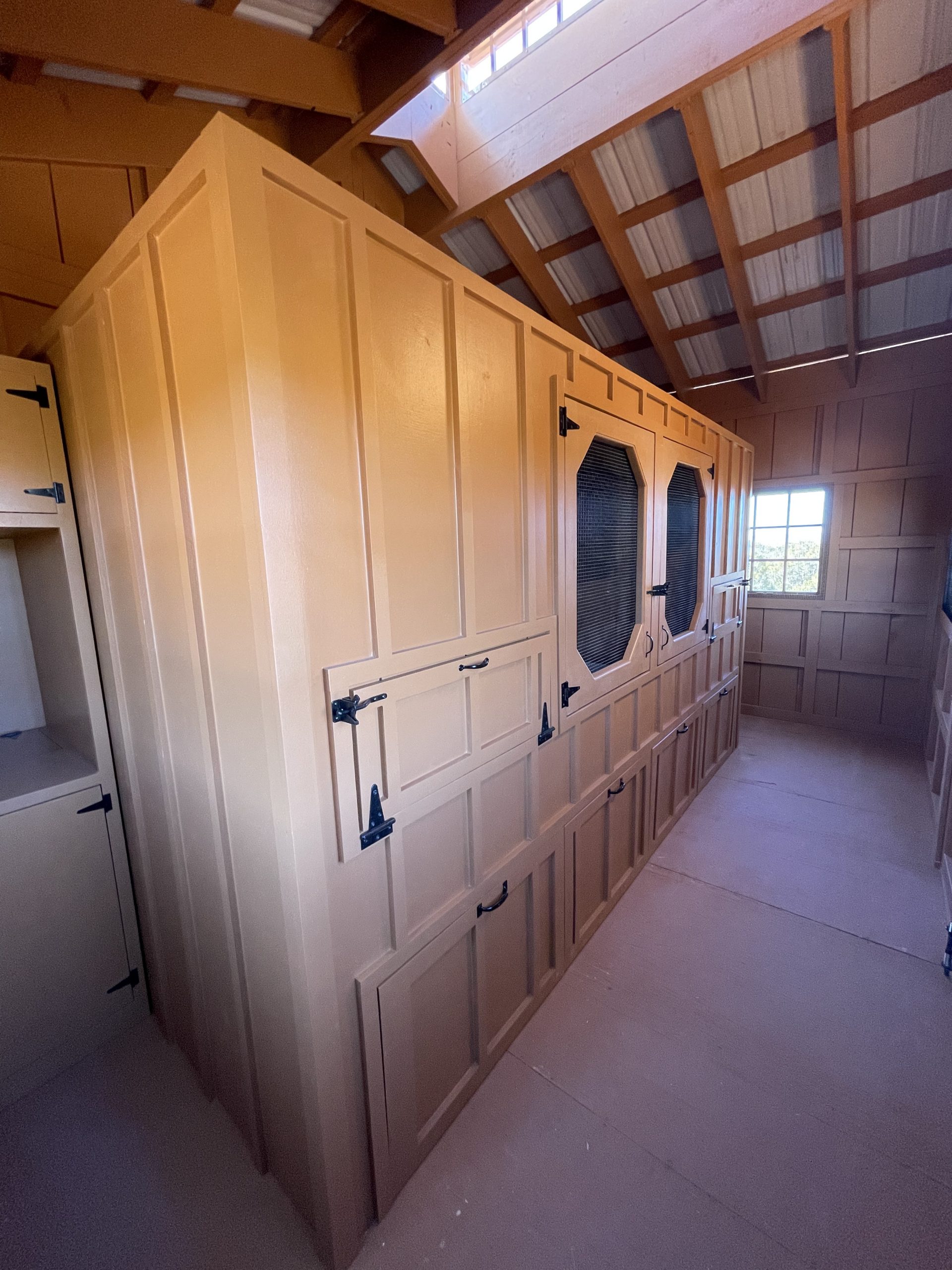 interior of henhouse shed area of custom coop in Santa Fe, NM