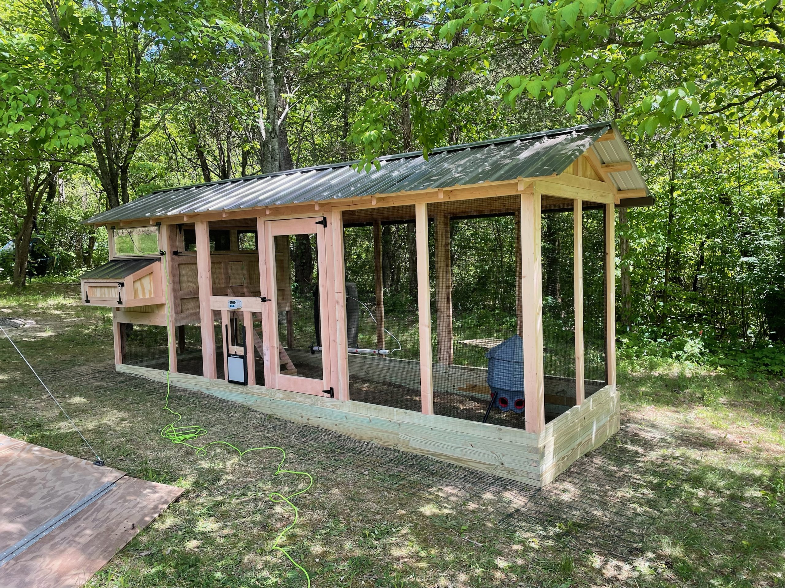 6×18 American Coop with automatic free range door and poultry water system built on a base in Mascot, TN