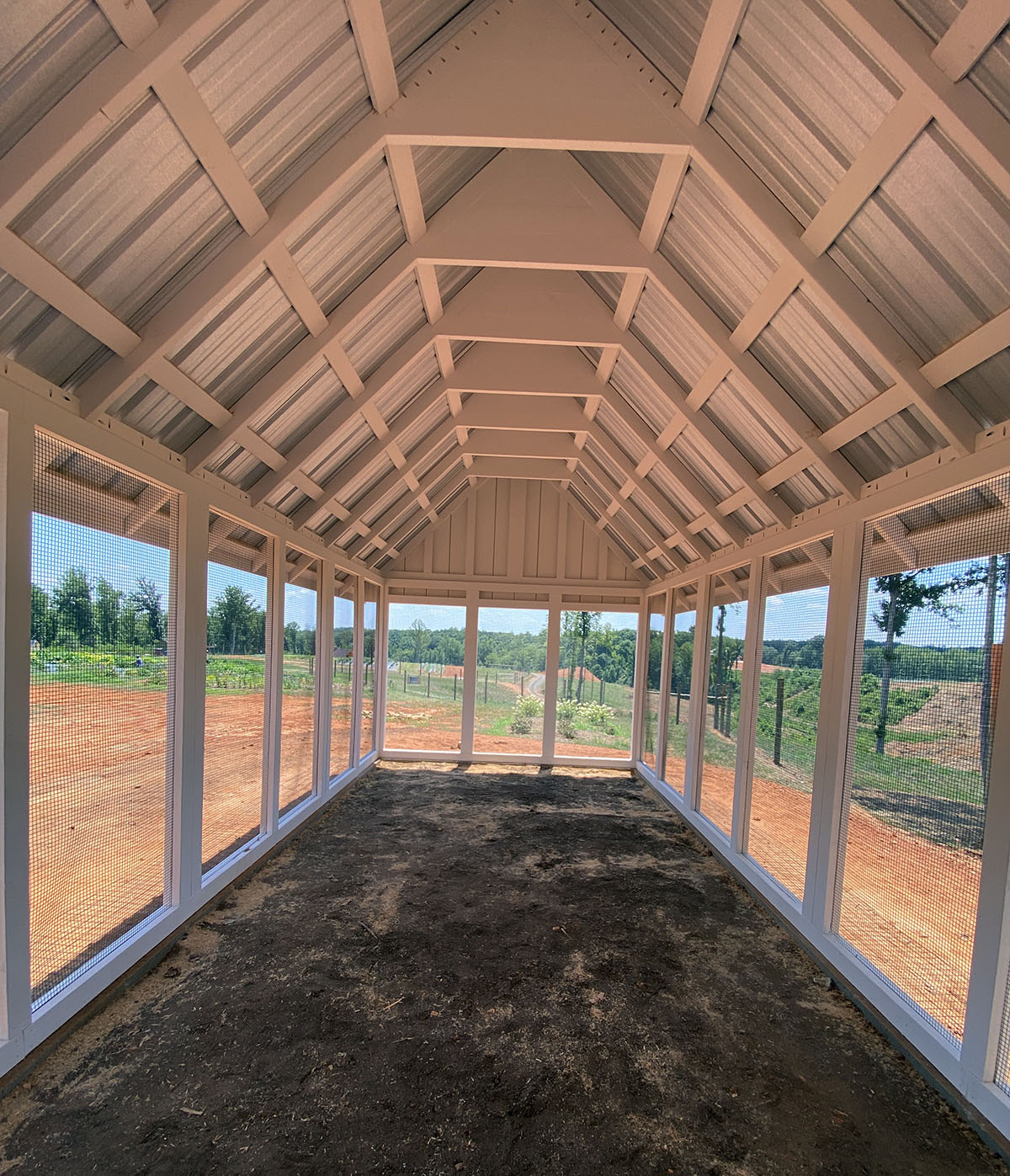 Inside the run of a 10x30 Gothic Craftsman Coop in Sandy Ridge, NC